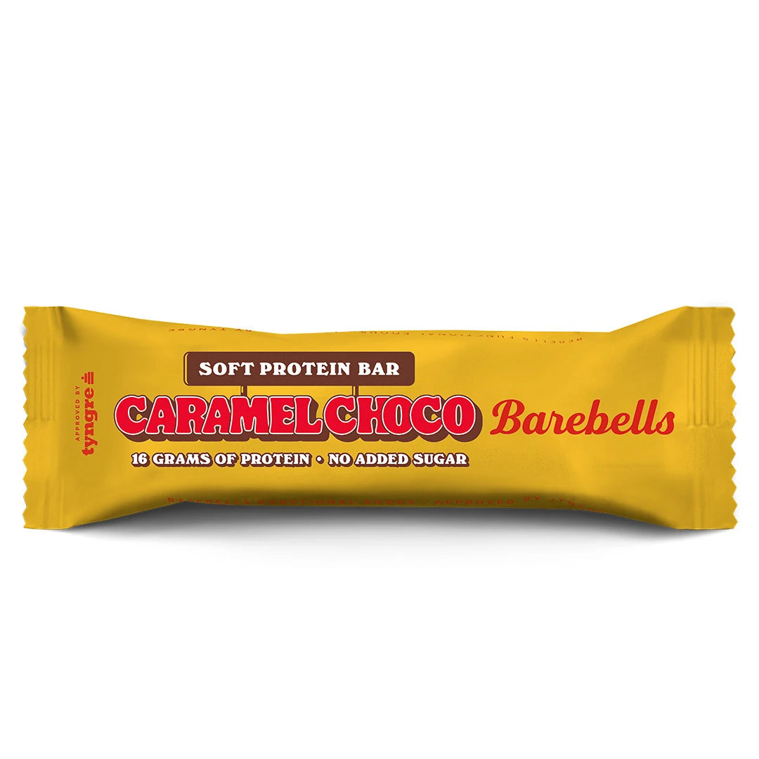 Barebells Soft protein bar 55 g i en gul förpackning med röd text för smaken Caramel Choco., bild 4 av 21