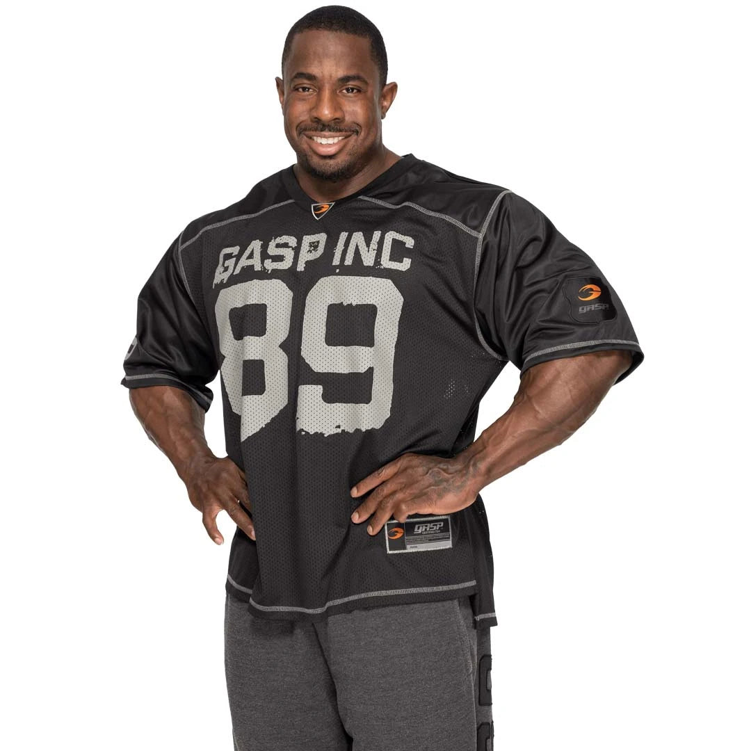 GASP No1 Football Tee Black, en svart oversized tränings-t-shirt i mesh med vitt GASP INC 89-tryck på bröstet., bild 1 av 2
