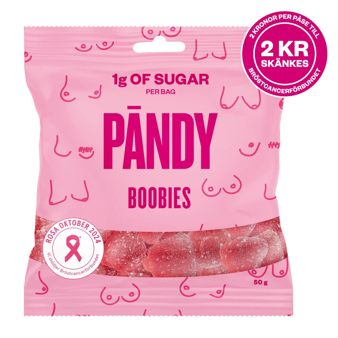 Pändy Candy 50 g Boobies i en ljusrosa påse med Rosa Bandet-logga och synligt rött gelégodis., bild 1 av 1