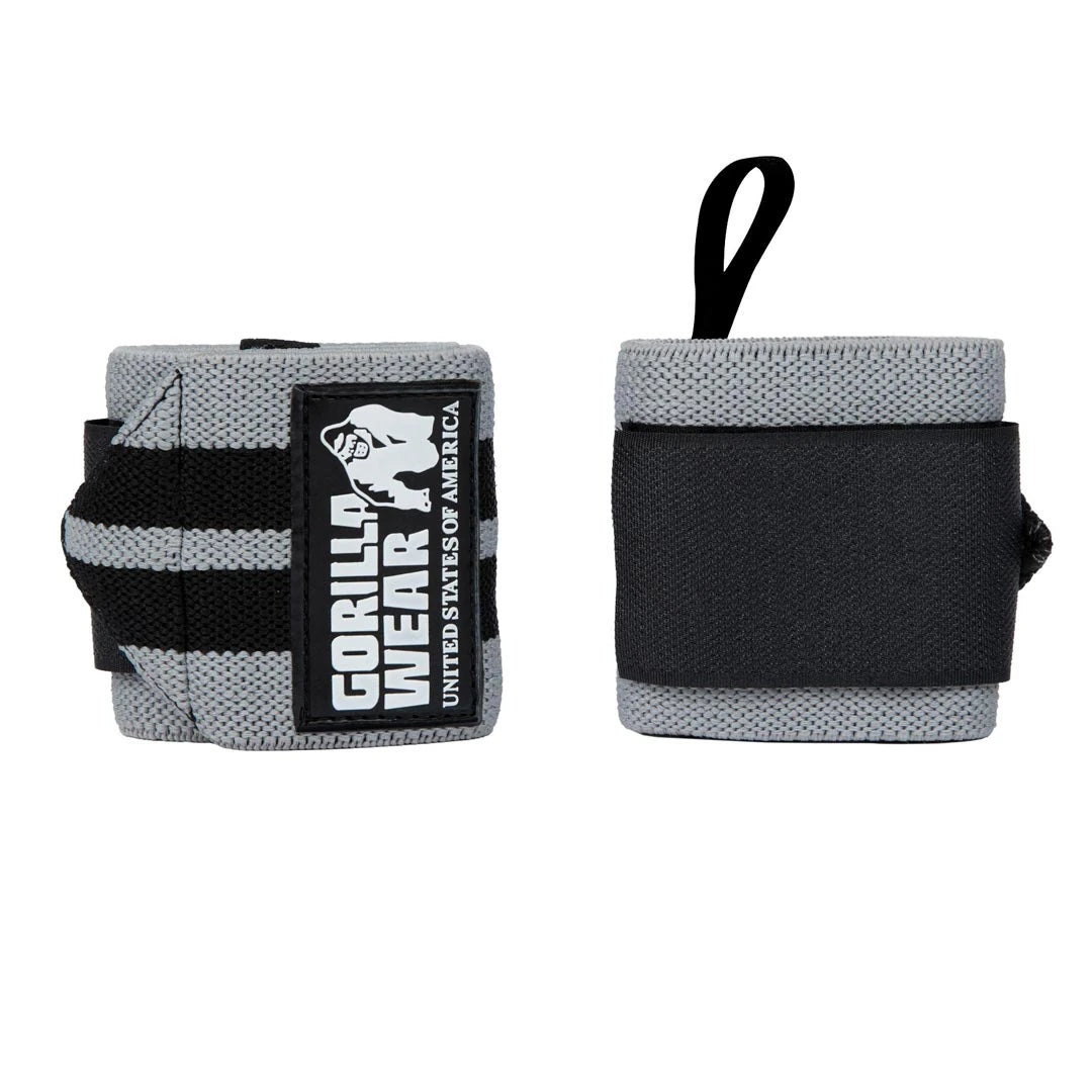 Grå och svarta Gorilla Wear Wrist Wraps Pro Black/Gold handledslindor med tumögla för tunga lyft., bild 1 av 1