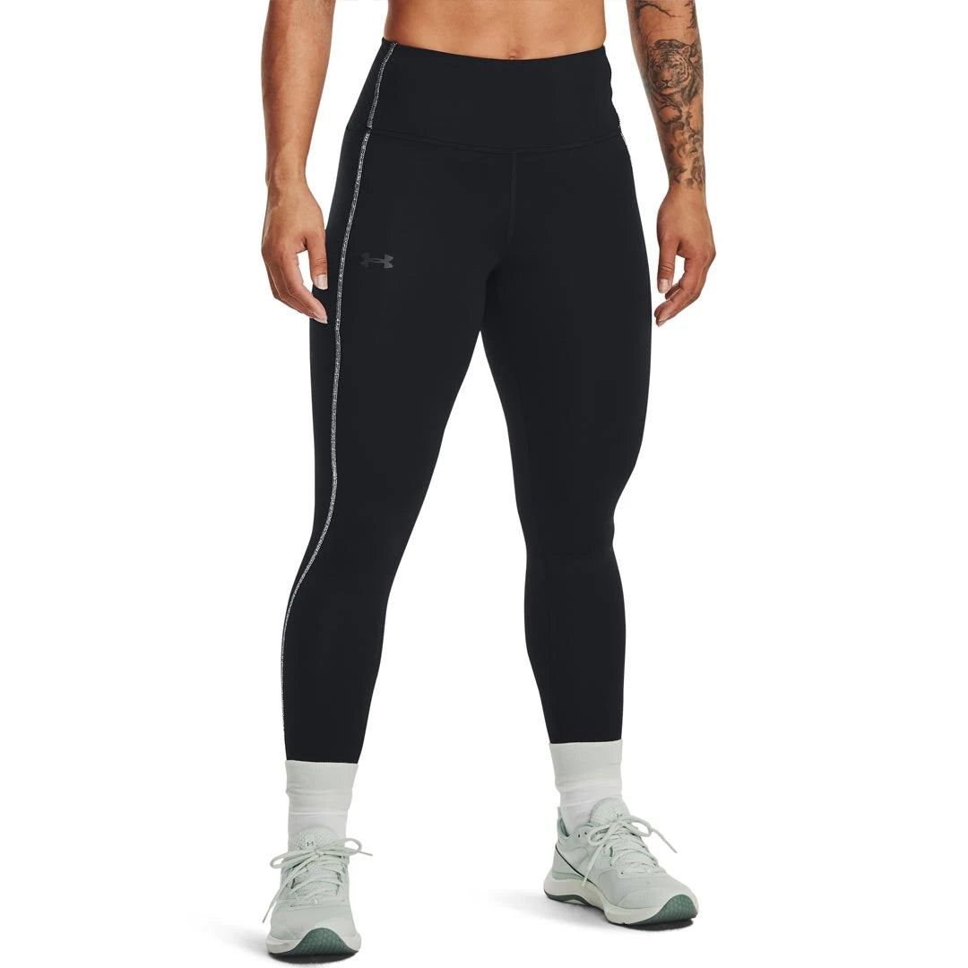 Under Armour Train CW Legging Black/Jet Grey, svarta träningstights med hög midja och ljusgrå rand längs höger ben., bild 1 av 2