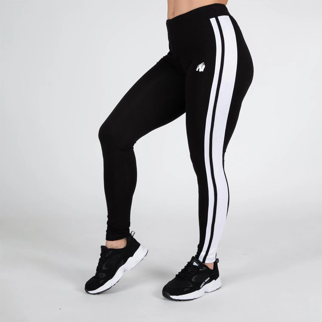 Gorilla Wear Hailey Leggings Black är svarta träningstights för dam med tight passform och bred vit sidorevär., bild 5 av 5