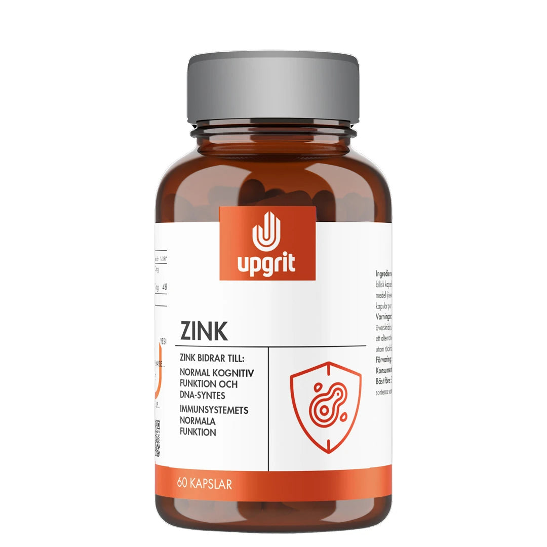 Upgrit Zink 60 caps kosttillskott i en mörkbrun burk med grått lock, vit etikett och orange logotyp., bild 1 av 1