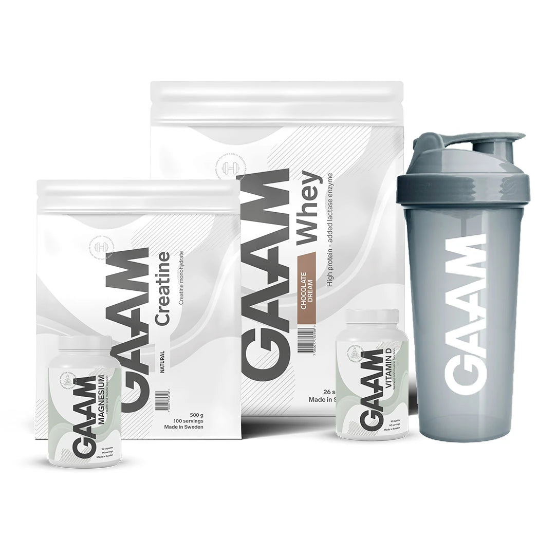 GAAM Startpaket med Whey och Creatine i vita påsar, två vita burkar för vitaminer och en grå shaker., bild 1 av 1