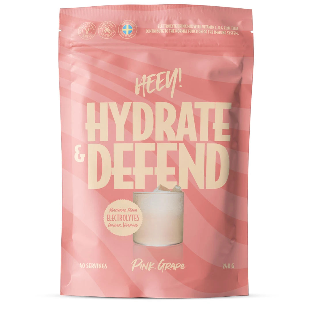 Heey! Hydrate &amp; Defend Electrolytes + Immune Support 240 g elektrolytpulver i en mönstrad rosa påse för smaken Pink Grape., bild 1 av 1