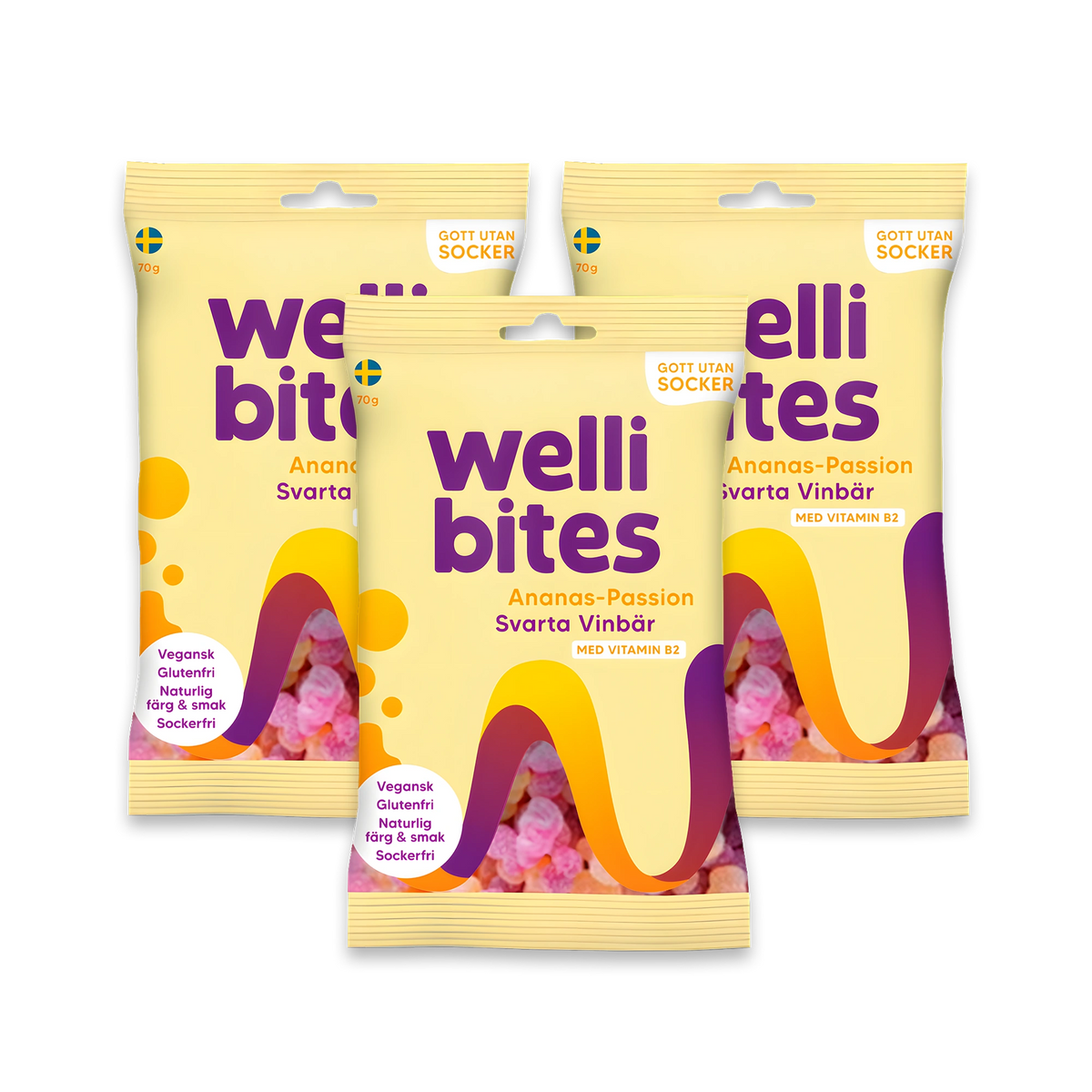 3 x Wellibites Candy 70 g sockerfritt godis i tre gula påsar med lila och orange detaljer för smaken Ananas-Passion &amp; Svarta vinbär., bild 1 av 1