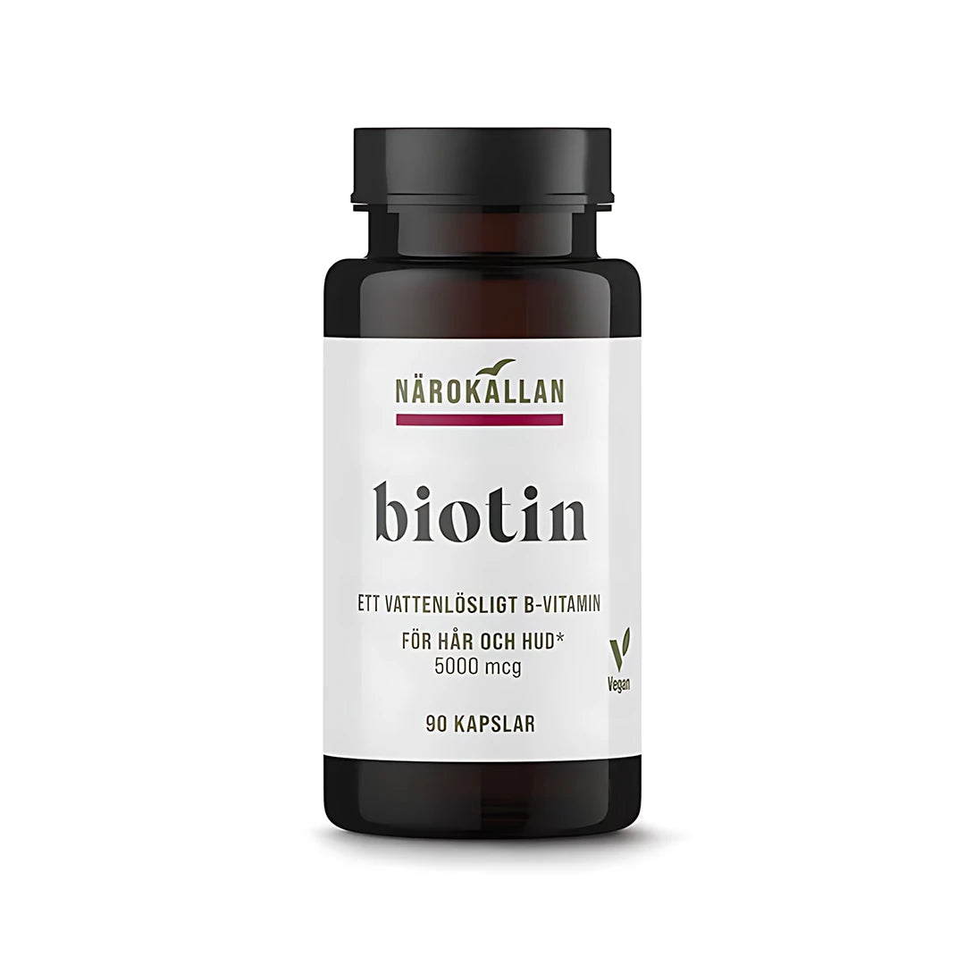 Närokällan Biotin 5000 mcg 90 caps, ett veganskt kosttillskott i en mörkbrun burk med vit etikett., bild 1 av 1