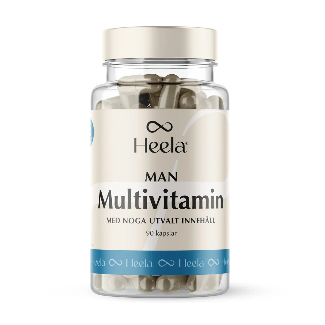 Heela Multivitamin Man 60 caps förvarade i en transparent plastburk med ljusbeige och blå etikett samt ett ljust skruvlock., bild 1 av 1