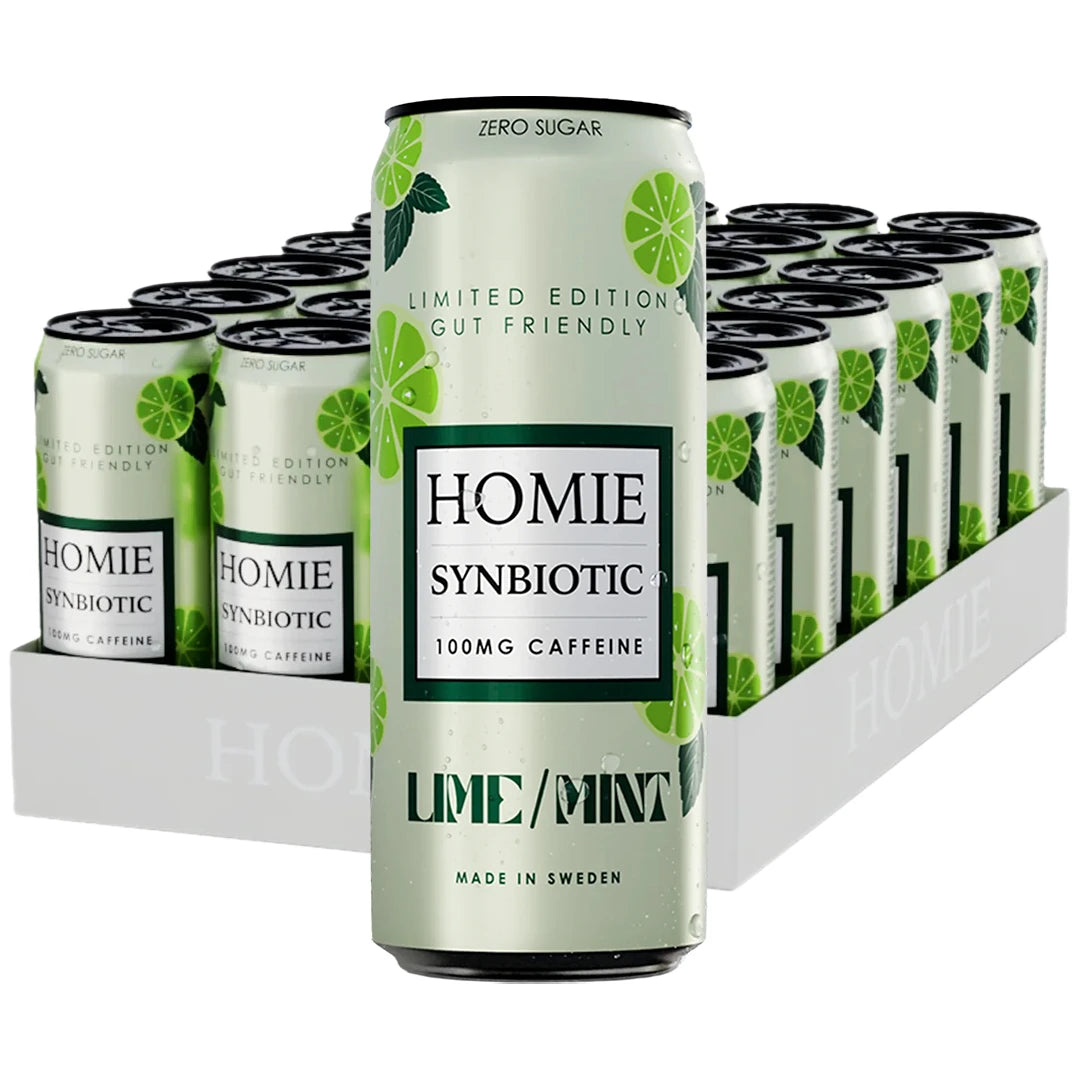 24 x Homie Wake Up Synbiotic 330 ml Lime/Mint i ett vitt flak med ljusgröna burkar dekorerade med limeskivor., bild 1 av 1