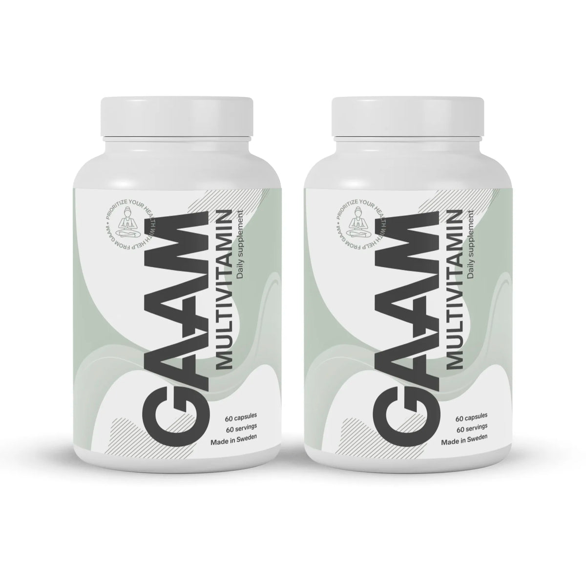 2 x GAAM Multivitamin 60 caps i två vita burkar med ljusgröna detaljer och svart text., bild 1 av 1