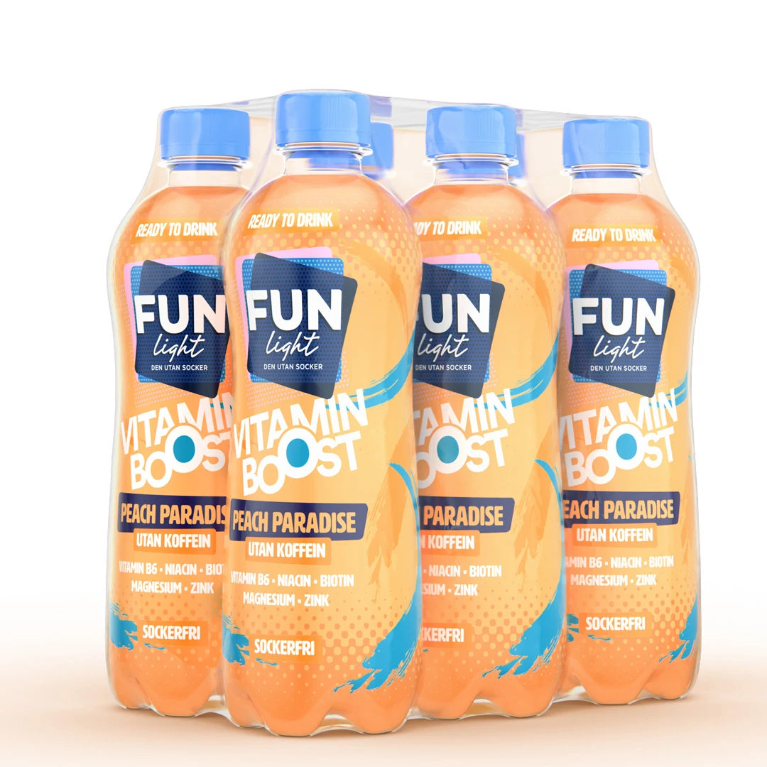 6 x Fun Light Vitamin Boost 500 ml Peach Paradise i ett 6-pack av plastflaskor med blåa korkar och orangefärgad dryck., bild 1 av 1