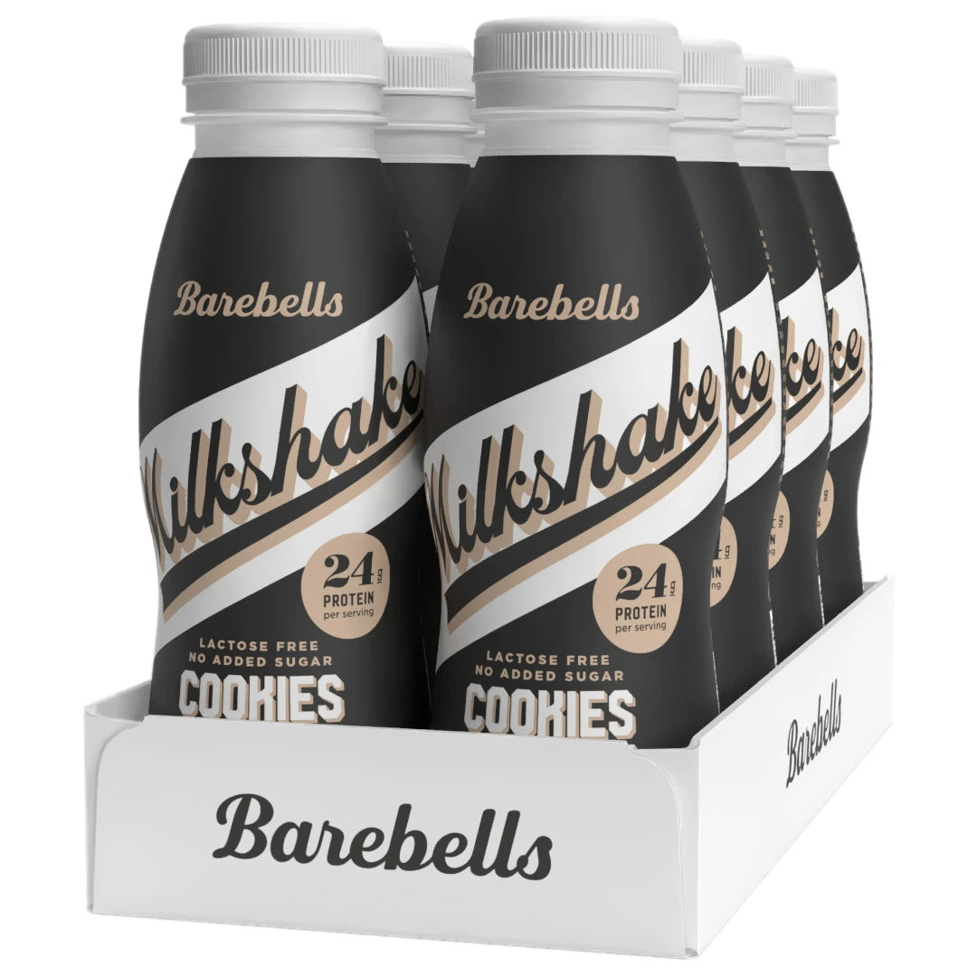 8 x Barebells Milkshake 330 ml Cookies &amp; Cream i ett vitt flak med svarta flaskor och vita detaljer., bild 1 av 1