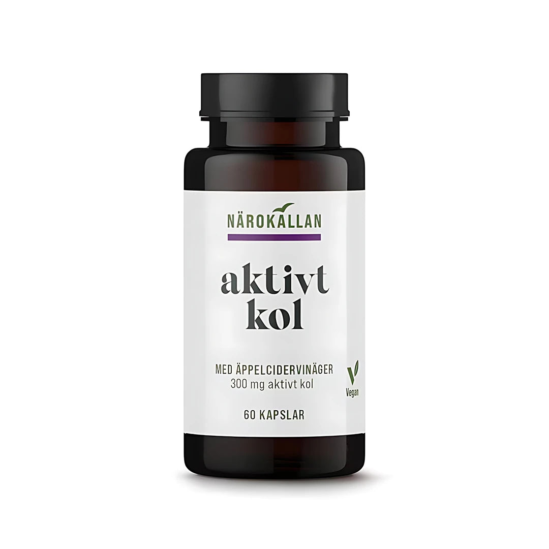 Närokällan Aktivt kol + Äppelcidervinäger 60 caps i en mörk burk med vit etikett., bild 1 av 1
