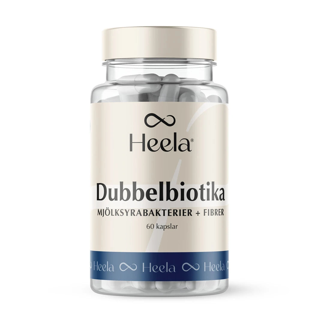 Heela Dubbelbiotika 60 caps i en genomskinlig burk med beige etikett, blåa detaljer och vita kapslar inuti., bild 1 av 1