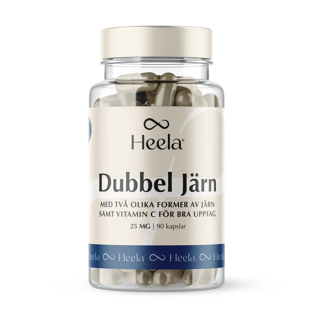 Heela Dubbel Järn 25 mg 90 caps kosttillskott i en genomskinlig plastburk med beige och blå etikett, fylld med kapslar., bild 1 av 1