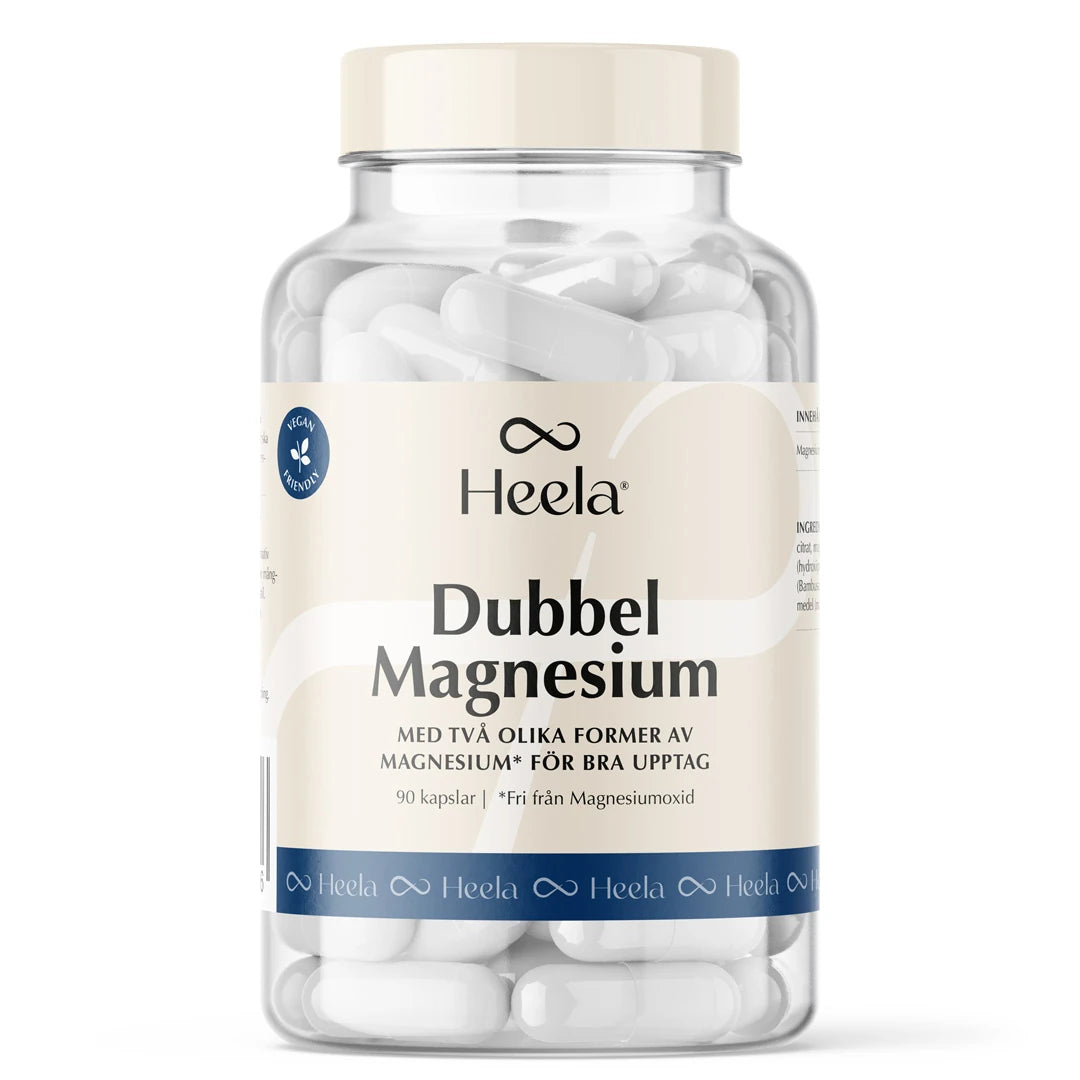 Heela Dubbel Magnesium 90 caps kosttillskott i en genomskinlig burk med ljus etikett, fylld med vita kapslar., bild 1 av 1