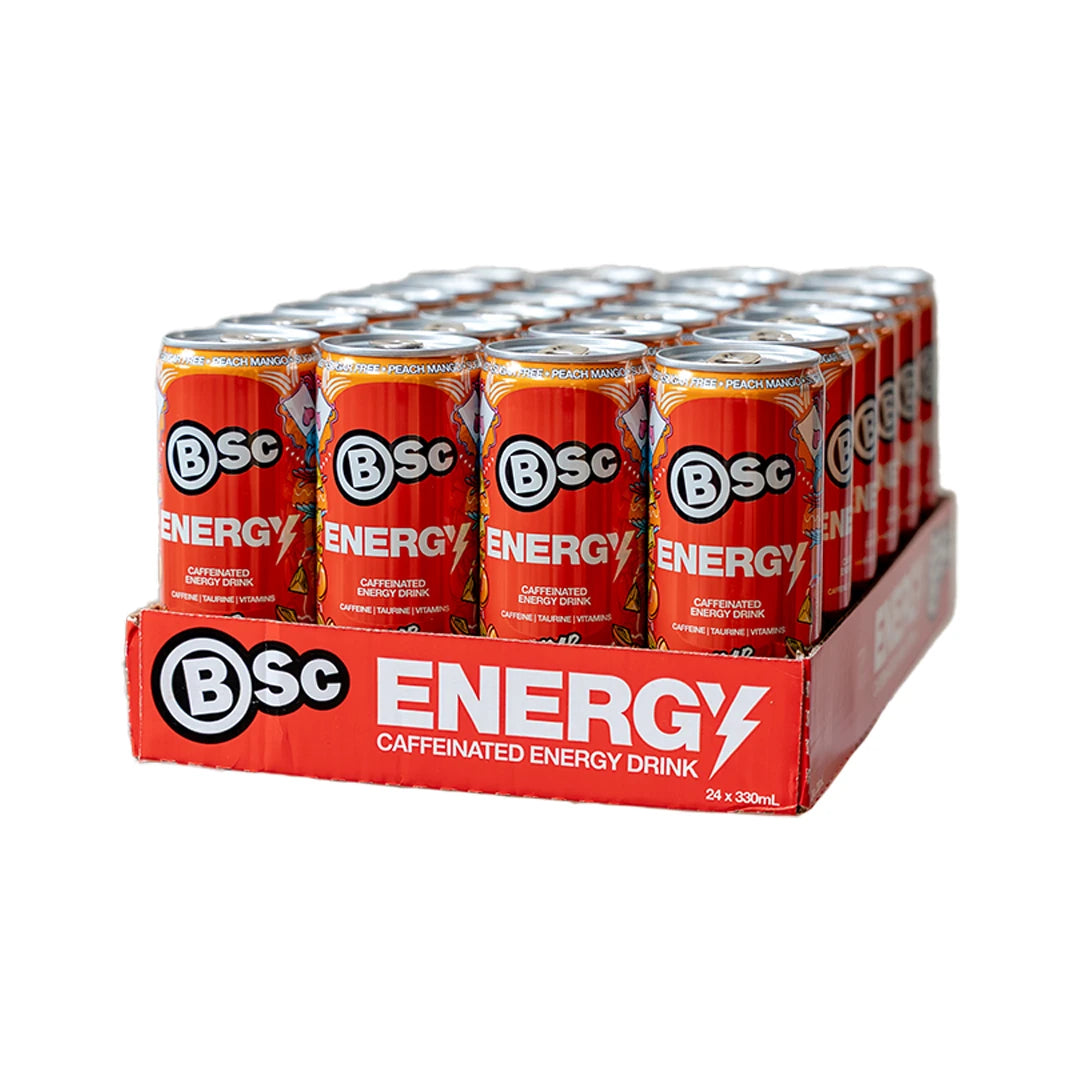 24 x BSc Energy Drink 330 ml Peach Mango i ett rött pappflak med matchande orange och röda burkar., bild 1 av 1