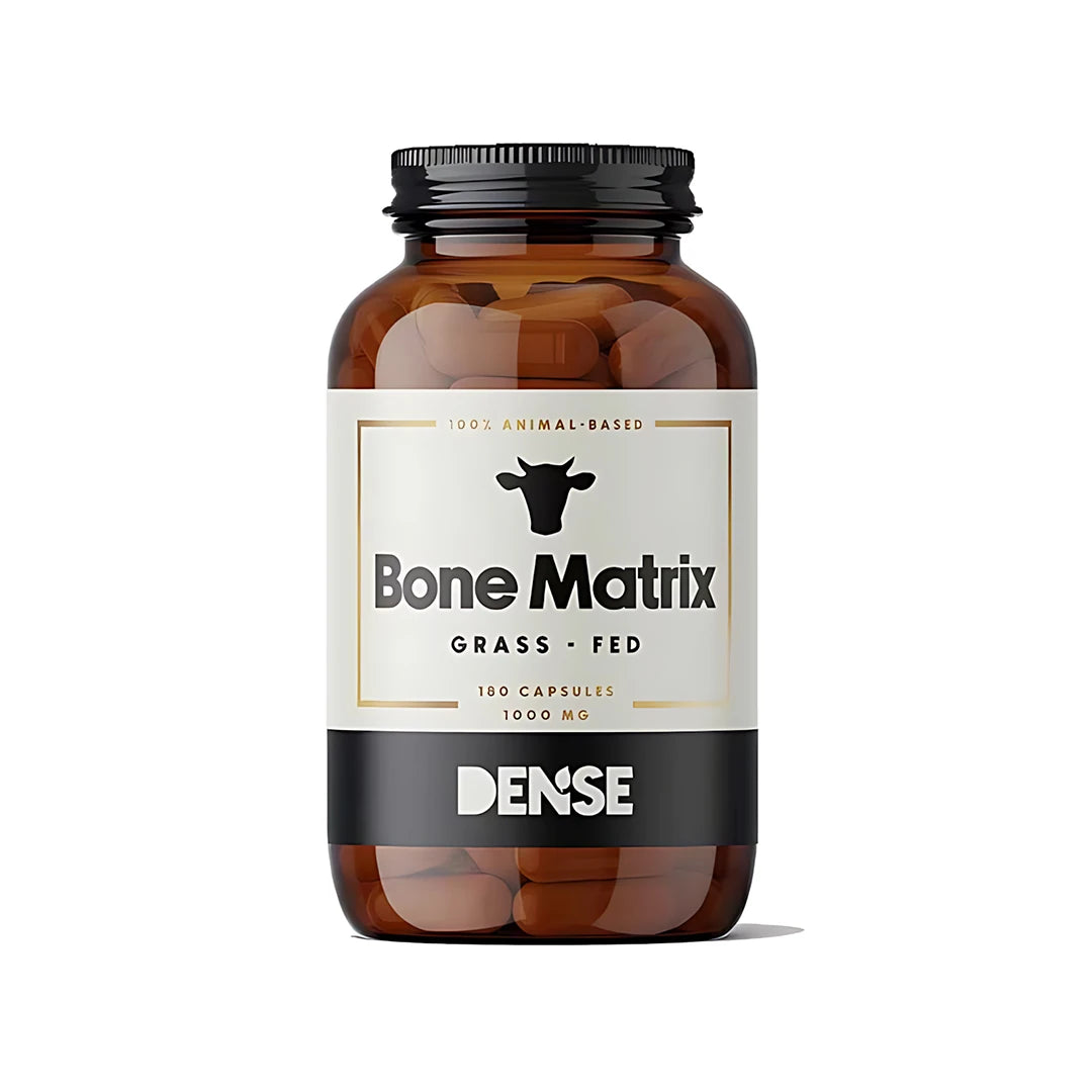 Dense Bone Matrix 180 caps kalciumtillskott i en mörkbrun burk med vit och svart etikett och gulddetaljer., bild 1 av 1