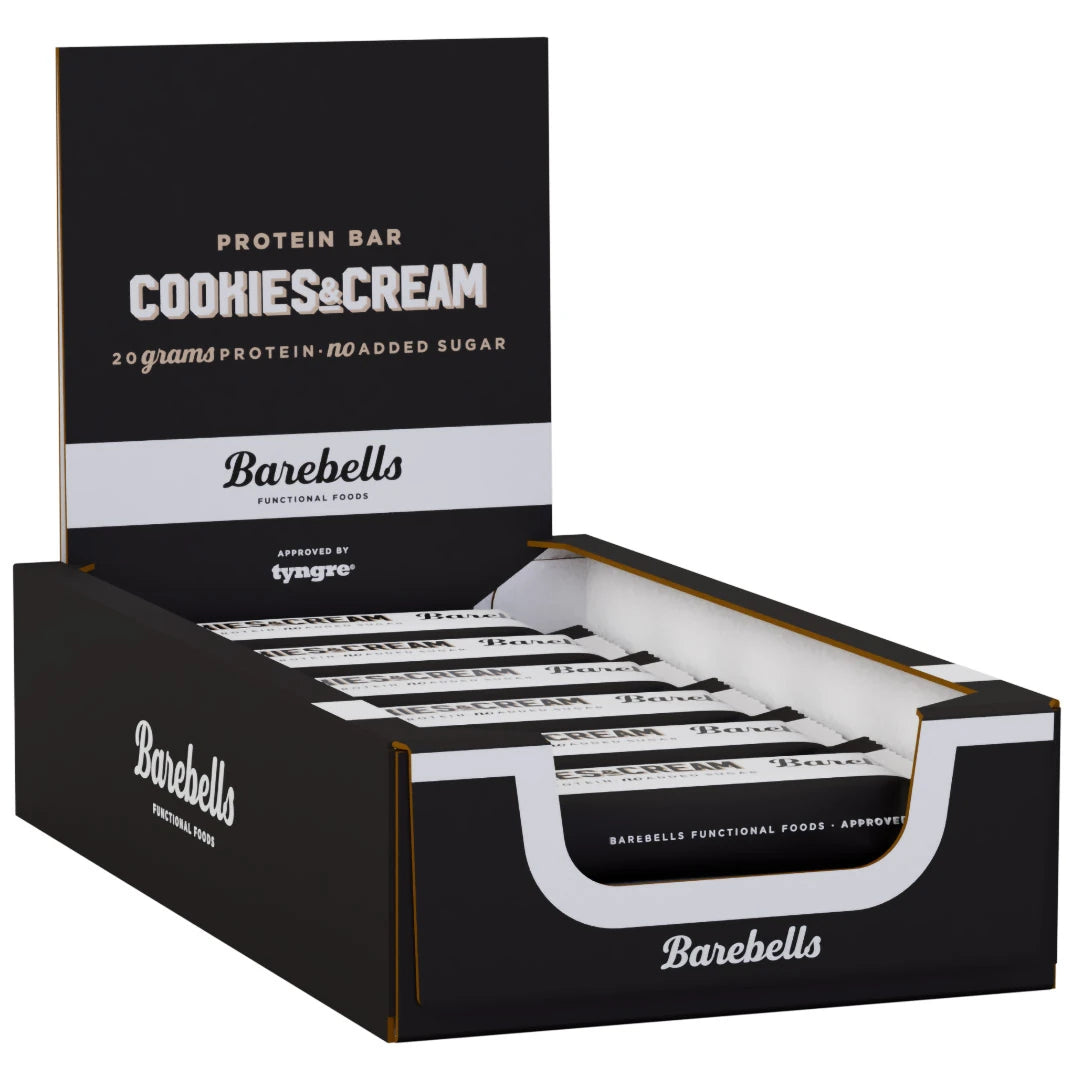 12 x Barebells Protein Bar 55 g Cookies &amp; Cream i en svartvit displaylåda fylld med proteinbars., bild 1 av 1