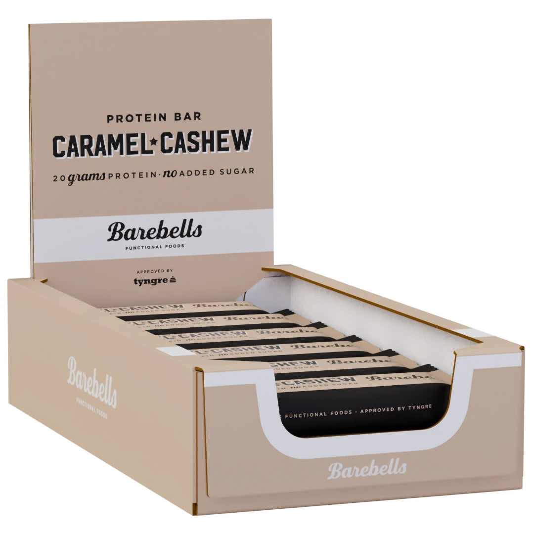 12 x Barebells Protein Bar 55 g Caramel and Cashew i en beige displaylåda med svarta och beiga proteinbars., bild 1 av 1