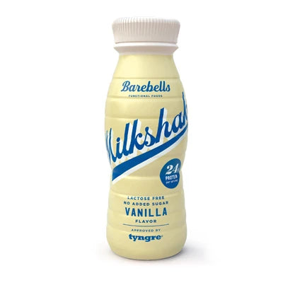 Barebells Milkshake 330 ml proteindryck i en ljusgul flaska med blå text för smaken Vanilla., bild 7 av 9