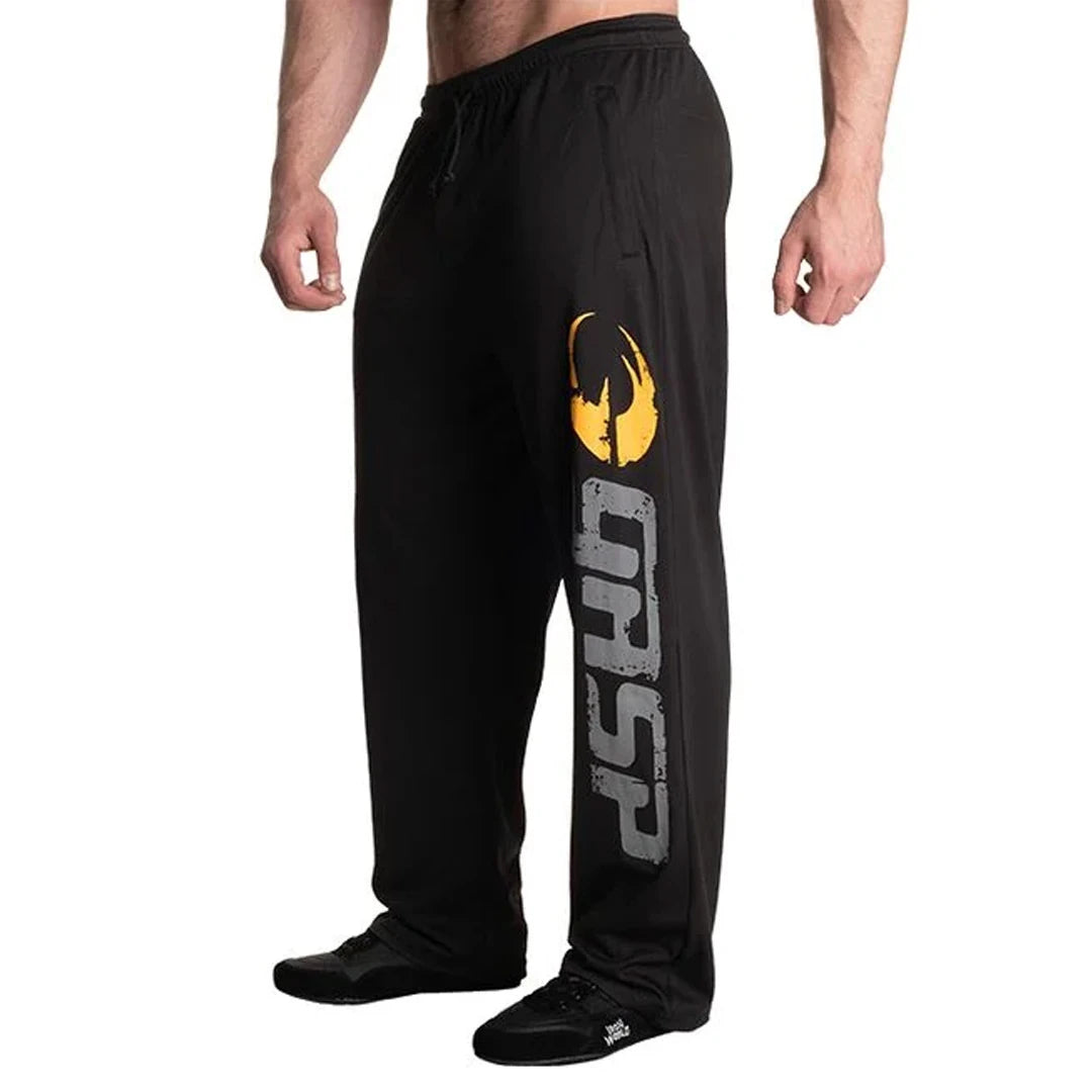 GASP Original Mesh Pants Black är lediga svarta träningsbyxor i mesh med en stor vertikal logotyp på benet., bild 1 av 6