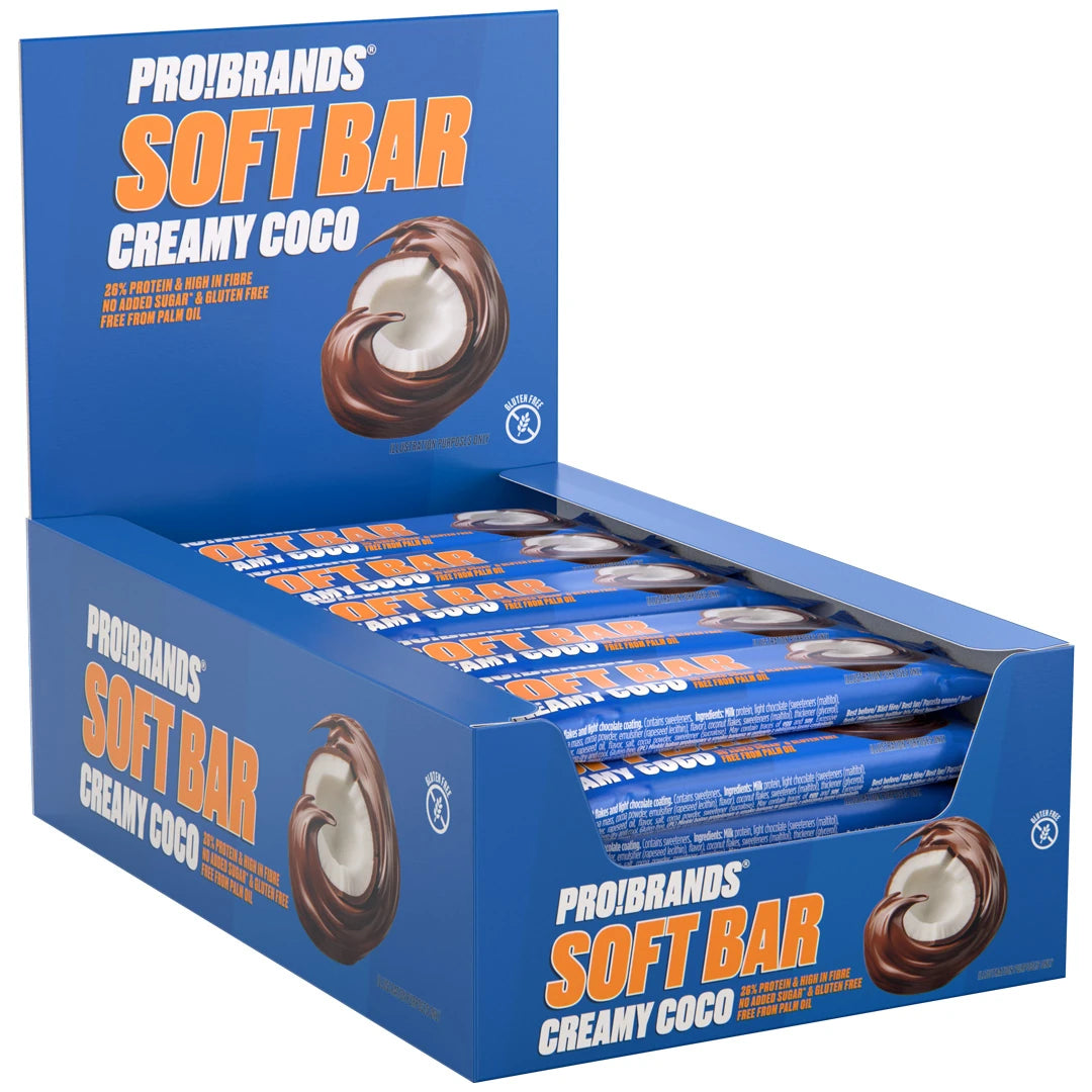 15 x Pro Brands Softbar 40 g Creamy Coco i en blå låda fylld med proteinbars i blått omslag med en bild av kokos och choklad., bild 1 av 1