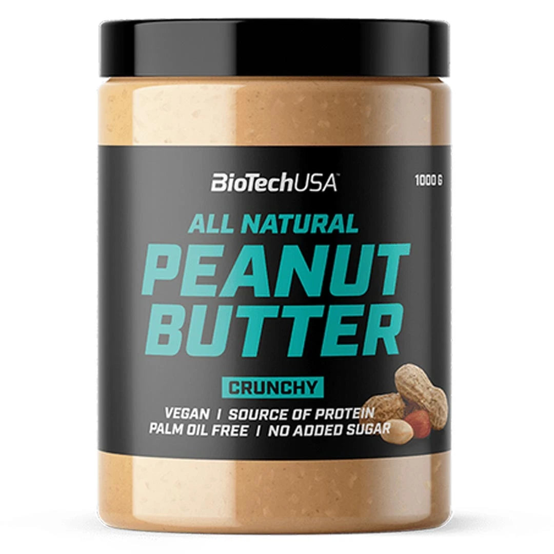 BioTechUSA Peanut Butter 1 kg i en transparent burk med svart etikett och turkos text för varianten Crunchy.