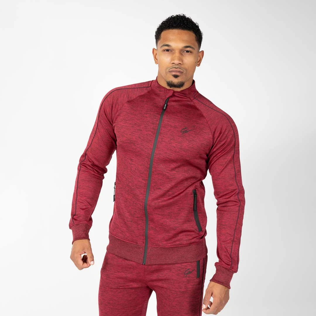 Gorilla Wear Wenden Track Jacket Burgundy Red, en mörkröd träningsjacka i stretch med svarta detaljer och dragkedja., bild 3 av 8