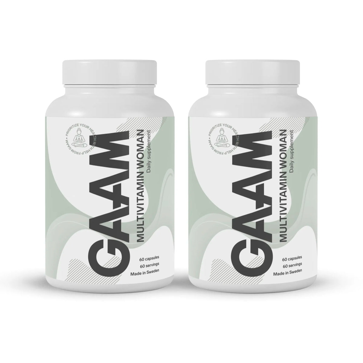 2 x GAAM Multivitamin Woman 60 caps i två vita burkar med ljusgröna detaljer på etiketten.