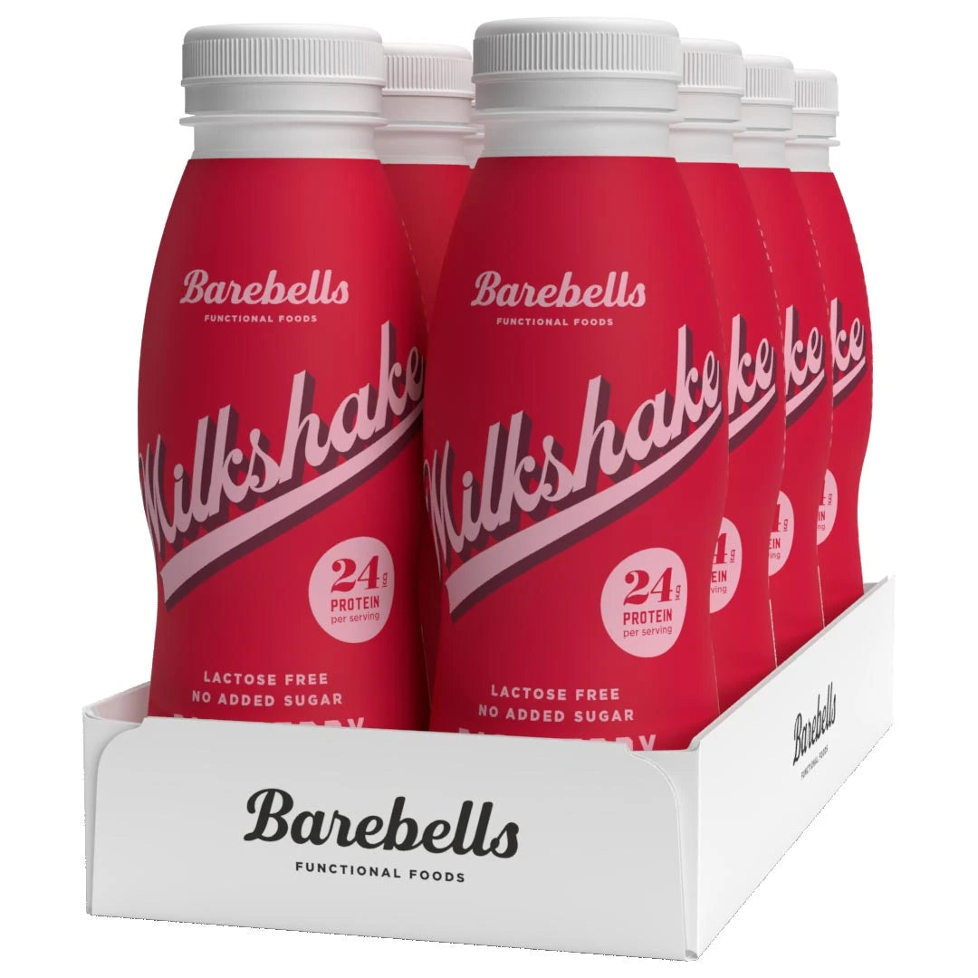 8 x Barebells Milkshake 330 ml Raspberry i ett vitt flak med åtta röda flaskor för smaken hallon., bild 1 av 1