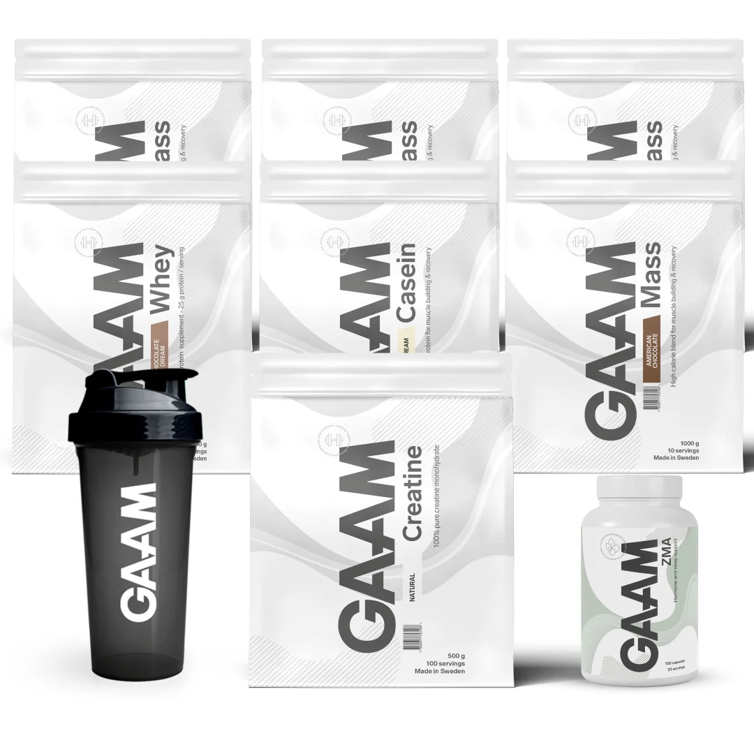 GAAM Complete Weight Gain Pack med kosttillskott i vita påsar, en burk och en svart shaker., bild 1 av 1