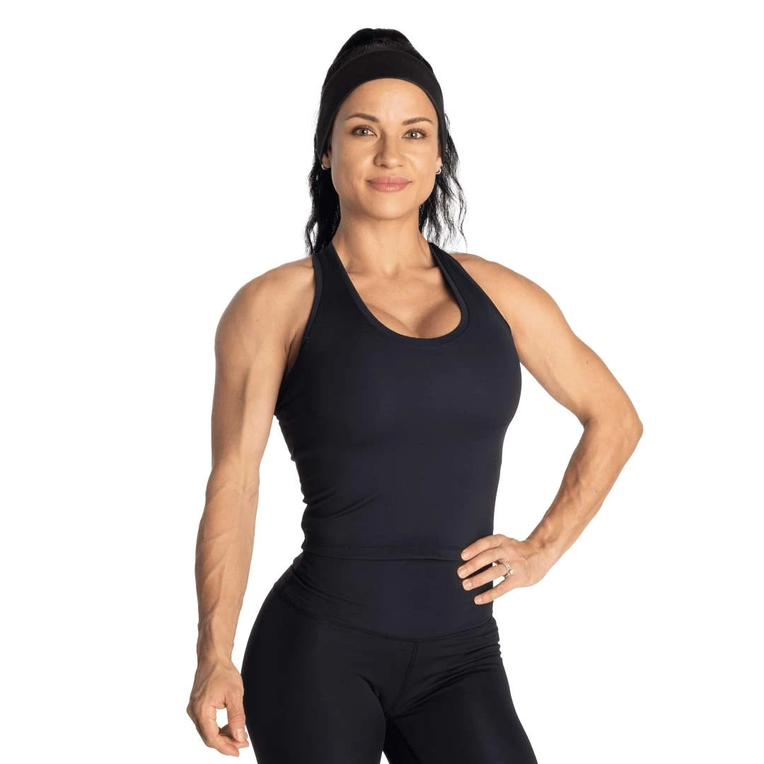 Better Bodies Core Crop T-back Black, ett svart croppat träningslinne för dam med slimmad passform., bild 1 av 5