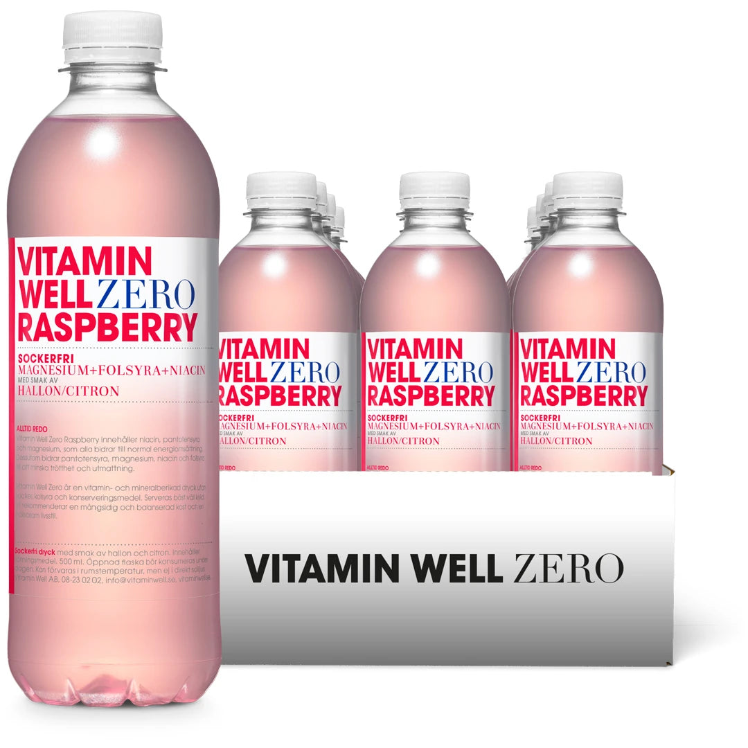 12 x Vitamin Well Zero 500 ml Raspberry i ett vitt flak med transparenta flaskor fyllda med rosa dryck., bild 1 av 1