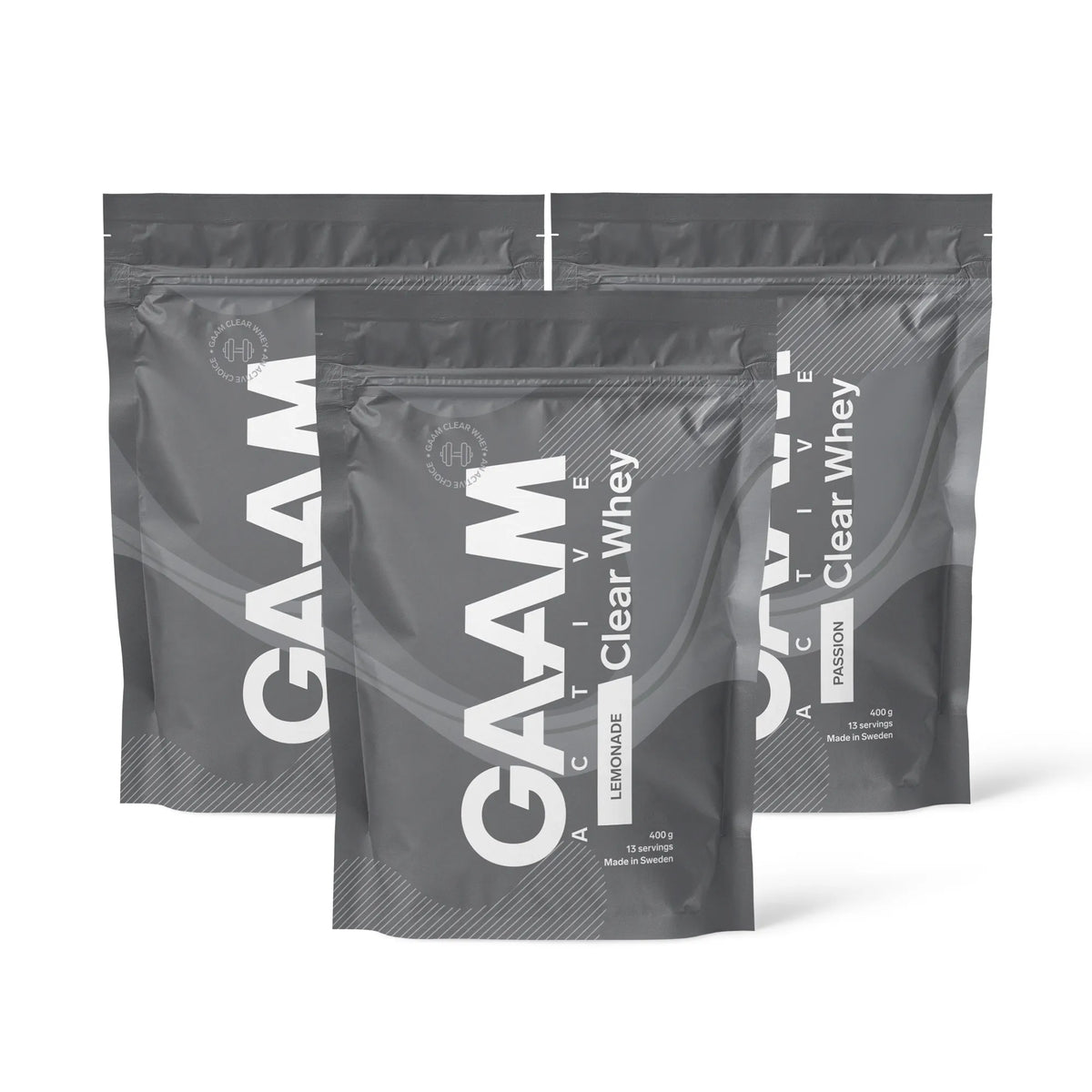 3 x GAAM Active Clear Whey Proteinpulver 400 g i gråa påsar med vit text för smakerna Lemonade och Passion., bild 1 av 1