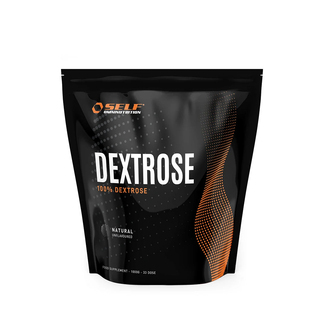 Self Omninutrition Dextrose 1 kg förpackad i en svart påse med orange detaljer och text för produkttypen kolhydrater., bild 1 av 1