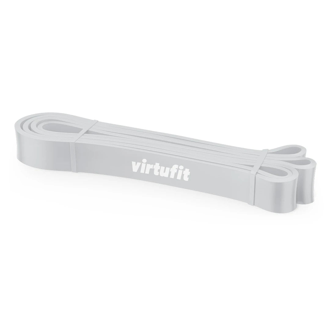 Ljusgrått träningsband med vit logga av modellen Virtufit Power Band Extra Light för uppvärmning och styrketräning., bild 1 av 1