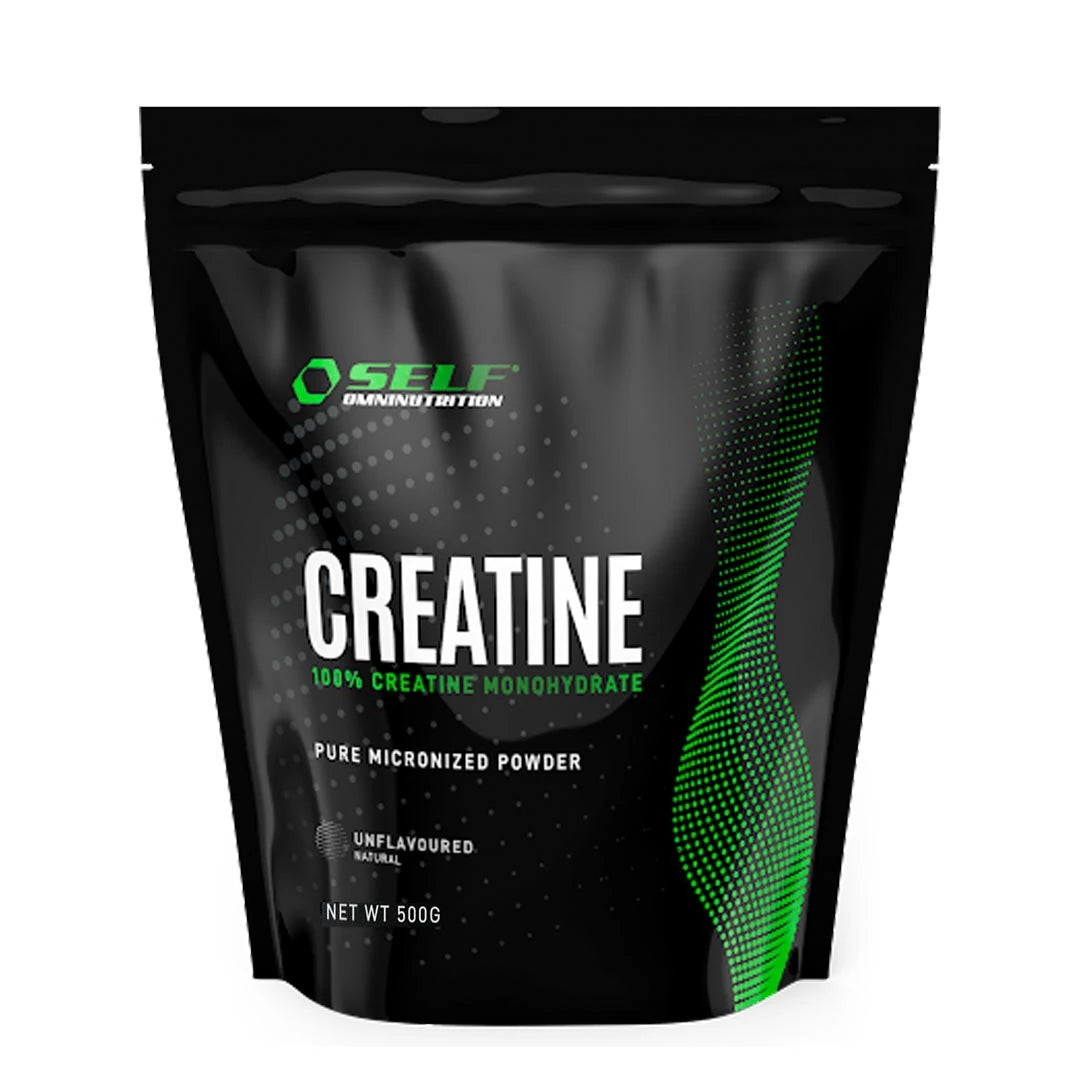 Self Omninutrition Creatine 500 g kreatinpulver i en svart påse med gröna detaljer och smaken naturell., bild 1 av 1