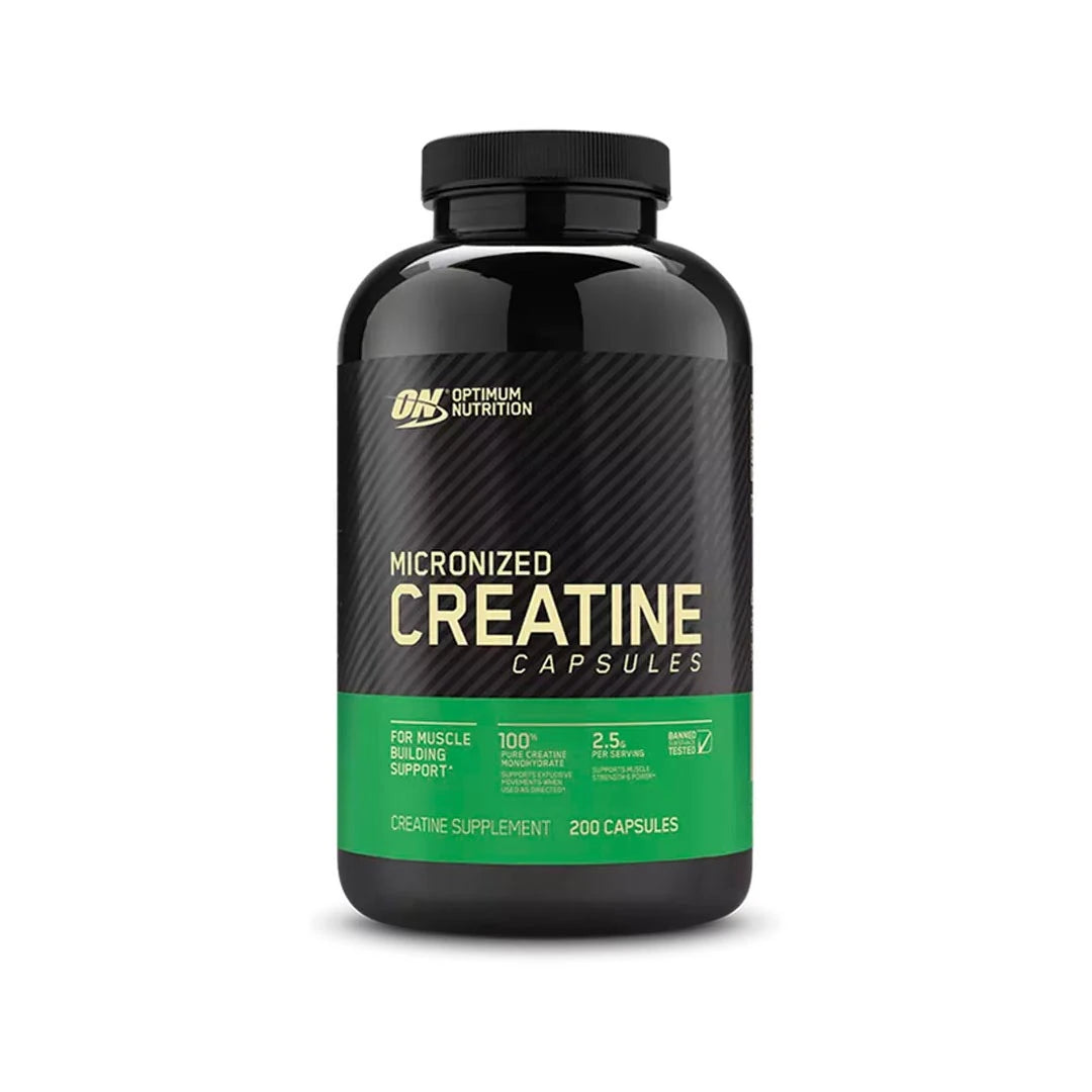 Optimum Nutrition Creatine Capsules 200 caps i en svart burk med grön etikett., bild 1 av 1